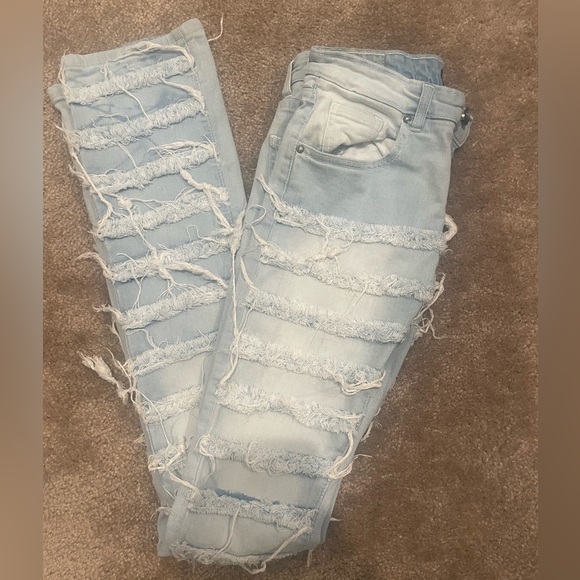 Distressed Light Blue Jeans - Picture 1 of 4